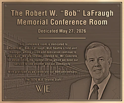 Bronze conference room dedication plaque design for the Robert W. Bob LaFraugh Memorial Conference Room, featuring an engraved portrait, the Murrow Bridge background, and the WJE logo.