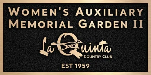 A bronze country club memorial garden plaque.