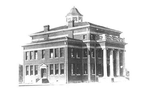 historic photo of a courthouse that was engraaved on a bronze plaques