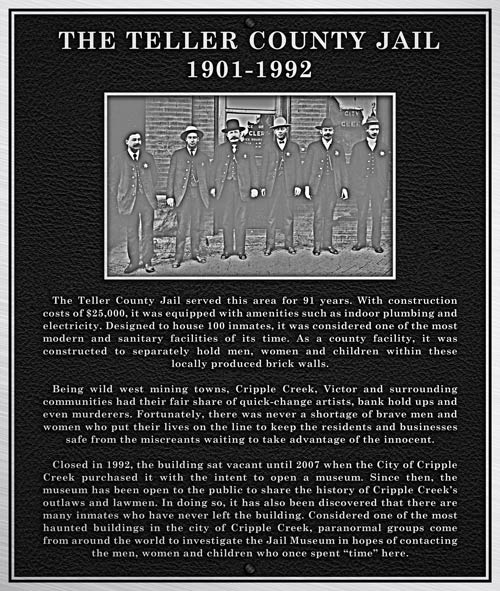 An aluminum plaque created for a Museum dedication that includes a historic photo.