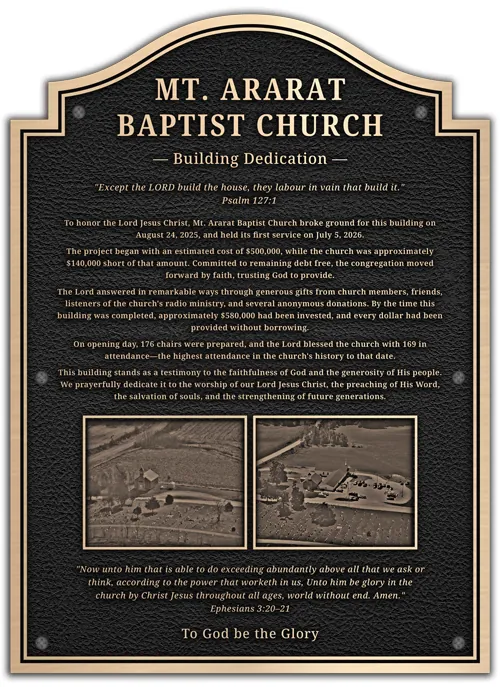 Bronze church building dedication plaque with an arched top, engraved scripture, dedication narrative, and two engraved photos of the church property.
