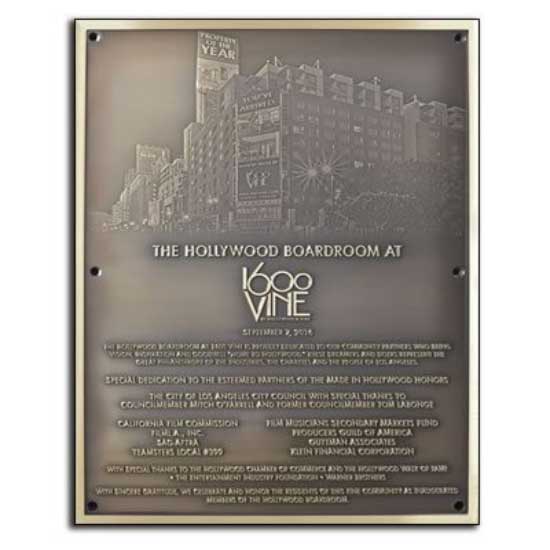 A bronze plaque used for a new building dedication.