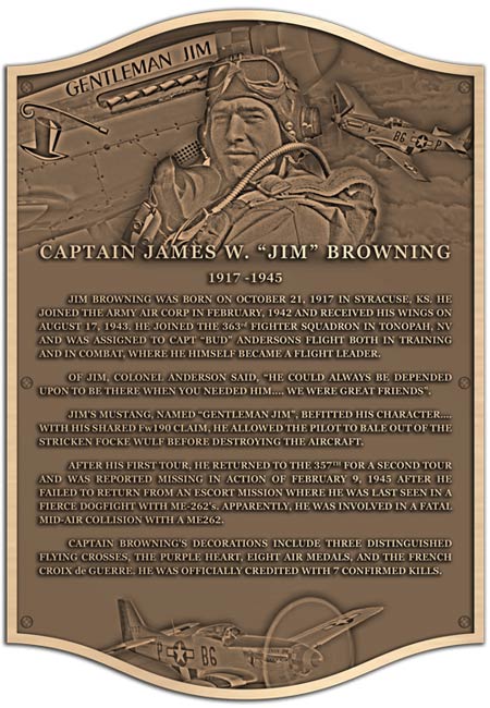 A bronze plaque of a WWII Pilot