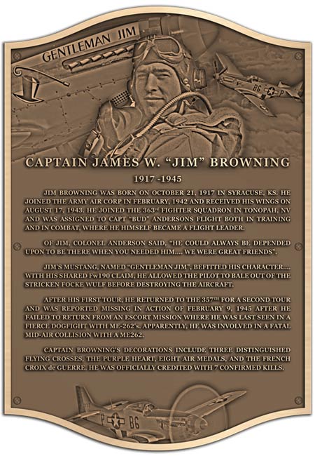 A bronze plaque of a WWII Pilot