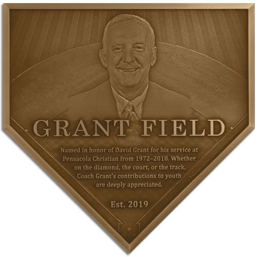 Bronze plaque used for a field dedication ceremony.