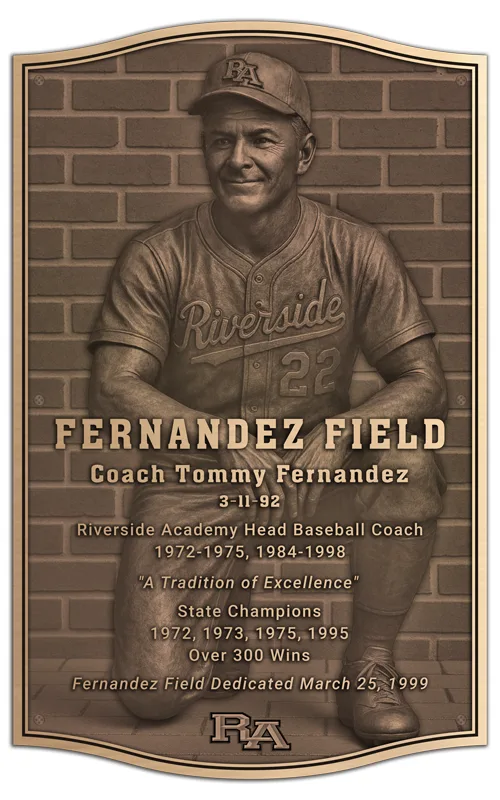 Fernandez Field bronze dedication plaque with a full-body engraved portrait of Coach Tommy Fernandez kneeling in his Riverside uniform