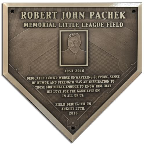 A bronze memorial plaque for a baseball coach.