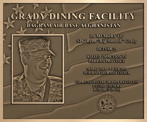 Bronze memorial plaque for the Grady Dining Facility, named for a fallen soldier