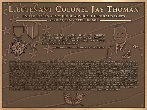 Bronze memorial plaque honoring Lieutenant Colonel Jay Thoman of the Judge Advocate General's Corps