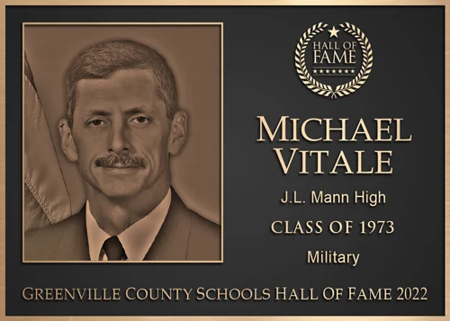 Bronze military hall of fame plaque with portrait relief and induction detail
