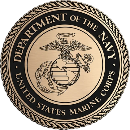 Recessed etched bronze U.S. Marine Corps seal on a flat brushed face