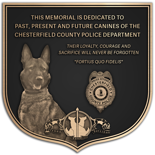 A bronze memorial plaque honoring a police K9.